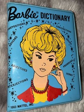 Barbie Blue Vinyl Cover with Yellow Hair and Red Accents